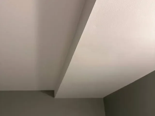 The same ceiling corner taped, finished and painted
