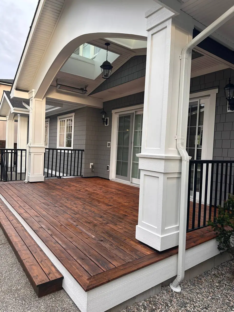 Finished deck staining Tsawwassen — porch and column view after staining