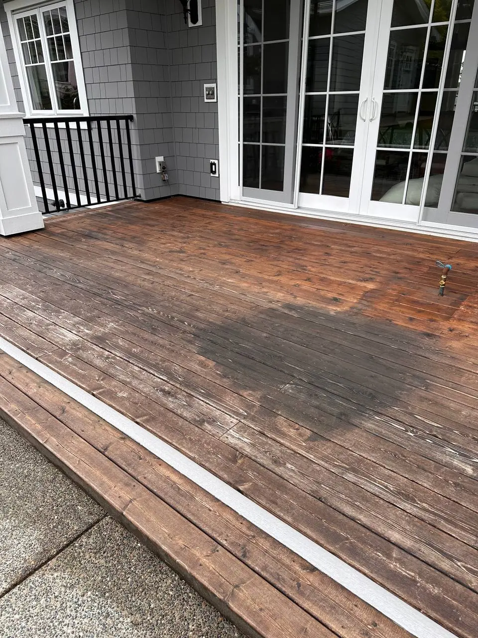 Tsawwassen deck before staining — weathered, faded, old stain worn through